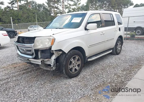 2011 Honda Pilot Touring из США, поврежденный, VIN 5FNYF3H95BB004152
